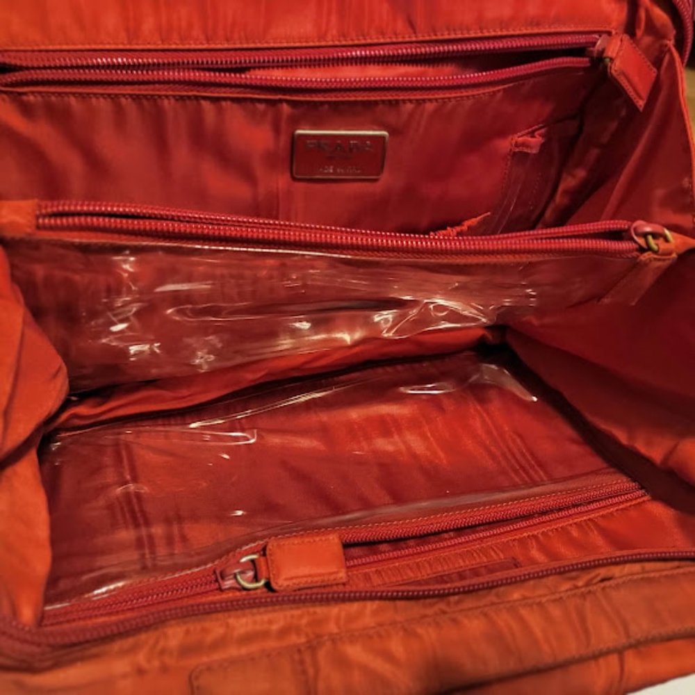 Prada red makeup bag